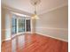 Charming dining room with gleaming hardwood floors and a bright bay window at 3195 Vickery Ne Dr, Marietta, GA 30066