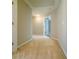 Hallway with beige carpet and neutral walls leads to other rooms in the home at 3195 Vickery Ne Dr, Marietta, GA 30066