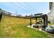 The home includes an outdoor gazebo with seating and a grill, perfect for backyard barbecues and entertainment at 2376 Allman Dr, Jonesboro, GA 30236