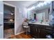 Bathroom featuring a white sink and vanity with a view into the bedroom at 2376 Allman Dr, Jonesboro, GA 30236