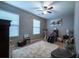 Bright bedroom with natural light from large windows and plush white rug at 2376 Allman Dr, Jonesboro, GA 30236