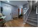 Inviting entryway featuring wood-look flooring, staircase and neutral wall color at 2376 Allman Dr, Jonesboro, GA 30236