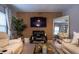 Inviting living room with modern decor, mounted TV, and comfortable seating at 2376 Allman Dr, Jonesboro, GA 30236