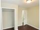 This bedroom features hardwood floors, and a closet at 2630 Colonial Dr, College Park, GA 30337