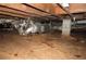 Spacious crawl space featuring an HVAC system, vapor barrier, and exposed beams at 2630 Colonial Dr, College Park, GA 30337