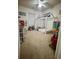 Bright bedroom features neutral carpet, white trim, and whimsical decor for a playful atmosphere at 3032 Cedar Glade Ln, Buford, GA 30519
