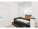 Bathroom featuring tiled floors, granite trimmed tub, large mirror, and wooden vanity at 3071 Lenox Ne Rd # 11, Atlanta, GA 30324