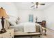 Comfortable bedroom featuring a wooden bed frame, soft lighting, and a tranquil atmosphere at 3071 Lenox Ne Rd # 11, Atlanta, GA 30324