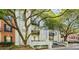Attractive building exterior with balconies, brick accents, and mature trees at 3071 Lenox Ne Rd # 11, Atlanta, GA 30324
