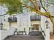 Elegant building exterior featuring balconies, decorative lamps, and a welcoming entrance at 3071 Lenox Ne Rd # 11, Atlanta, GA 30324