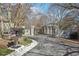 Gated community entrance featuring mature trees and landscaping provides a sense of exclusivity at 3071 Lenox Ne Rd # 11, Atlanta, GA 30324