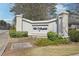 Stone entrance with 'The Vanderbilt' lettering, surrounded by well-manicured landscaping at 3071 Lenox Ne Rd # 11, Atlanta, GA 30324
