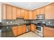Spacious kitchen featuring stainless steel appliances, granite countertops, and tile backsplash at 3071 Lenox Ne Rd # 11, Atlanta, GA 30324