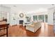 Bright living room with hardwood floors, fireplace and access to the outdoor balcony at 3071 Lenox Ne Rd # 11, Atlanta, GA 30324