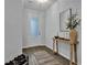 Welcoming entryway featuring a table with decorative items and a decorative rug at 2136 Garden Pl, Atlanta, GA 30316
