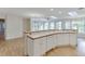 Bright eat-in kitchen featuring a large island, skylights, and hardwood floors at 130 Bonnie Ln, Sandy Springs, GA 30328