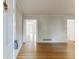 Inviting living room with hardwood floors and an open layout leading to sun room at 130 Bonnie Ln, Sandy Springs, GA 30328