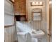 A bathroom featuring a pedestal sink, toilet, and medicine cabinet at 2516 Warwick Ne Cir, Atlanta, GA 30345