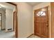 Inviting foyer with wood-paneled front door at 2516 Warwick Ne Cir, Atlanta, GA 30345