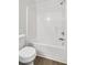 Bathroom features a shower-tub combo with a white shower curtain at 3682 Harvest Dr, Decatur, GA 30034