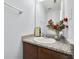 Half bathroom features granite countertops and new vanity at 3682 Harvest Dr, Decatur, GA 30034
