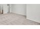 Neutral bedroom showcasing plush carpeting, base trim, and ample space at 3682 Harvest Dr, Decatur, GA 30034