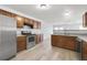 Fully equipped kitchen area features stainless appliances, granite countertops, and breakfast bar at 3682 Harvest Dr, Decatur, GA 30034