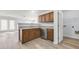 Galley kitchen offers plenty of counter space and features a stainless steel dishwasher at 3682 Harvest Dr, Decatur, GA 30034