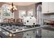 Close up view of a kitchen island and cooktop with a teapot at 720 First Cotton Dr, Powder Springs, GA 30127