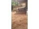 Backyard space featuring a covered wooden patio with stone steps and ground cover at 1759 Wilmont Ne Dr, Atlanta, GA 30329