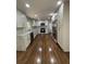 Modern kitchen with white cabinets, stainless steel appliances, and hardwood floors at 1759 Wilmont Ne Dr, Atlanta, GA 30329