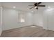 A bedroom featuring fresh paint, new floors, and a ceiling fan at 235 Dodd Sw Ave, Atlanta, GA 30315