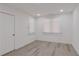 Bedroom featuring fresh paint, new floors, and a new door at 235 Dodd Sw Ave, Atlanta, GA 30315