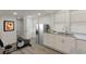 Bonus room features kitchenette and exercise bike perfect for a home gym at 235 Dodd Sw Ave, Atlanta, GA 30315