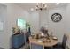 Cozy dining room with stylish furnishings and decor, featuring a wood table set for dinner at 235 Dodd Sw Ave, Atlanta, GA 30315