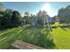 View from a deck looking out over a large lawn and mature trees at 2741 Willowstone Dr, Duluth, GA 30096