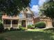 Beautiful two-story brick home with a well-manicured lawn and a two-car garage at 2741 Willowstone Dr, Duluth, GA 30096