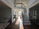 Grand foyer with soaring ceilings, hardwood floors, staircase and natural light at 2741 Willowstone Dr, Duluth, GA 30096