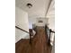 Second story hallway with hardwood flooring and banister at 2741 Willowstone Dr, Duluth, GA 30096