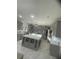 Bright kitchen with gray cabinets, stainless steel appliances, tile flooring, and a large center island at 2741 Willowstone Dr, Duluth, GA 30096