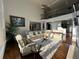 Living room boasts soaring ceilings, a second-story balcony, and a comfortable seating area at 2741 Willowstone Dr, Duluth, GA 30096