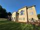 The rear exterior showcases a two-story design with a deck and a view of the green backyard at 2741 Willowstone Dr, Duluth, GA 30096