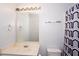 Functional bathroom with a clean vanity, mirror, and a shower with modern patterned curtain at 2763 Snapfinger Mnr, Decatur, GA 30035
