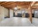 Spacious unfinished basement with windows and a door, offering abundant natural light and potential for development at 513 Mirramont Pl, Woodstock, GA 30189