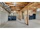 Unfinished basement with exposed beams and ductwork, perfect for future customization at 513 Mirramont Pl, Woodstock, GA 30189