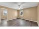 Bedroom with hardwood floors, natural light, and easy access to a bathroom at 513 Mirramont Pl, Woodstock, GA 30189