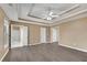 Expansive bedroom features ample space, great lighting, and seamless access to the ensuite bathroom at 513 Mirramont Pl, Woodstock, GA 30189