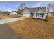 Charming single-story home with a two-car garage and cozy front yard at 2328 Wavetree Nw Ln, Acworth, GA 30101