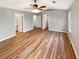 A bright main bedroom featuring wood floors and neutral walls at 2328 Wavetree Nw Ln, Acworth, GA 30101