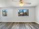 Bright bedroom featuring large windows and wood floors at 901 Chapman Cir, Stone Mountain, GA 30088